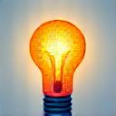 Icon of a lightbulb with circuit board elements, symbolizing innovation.